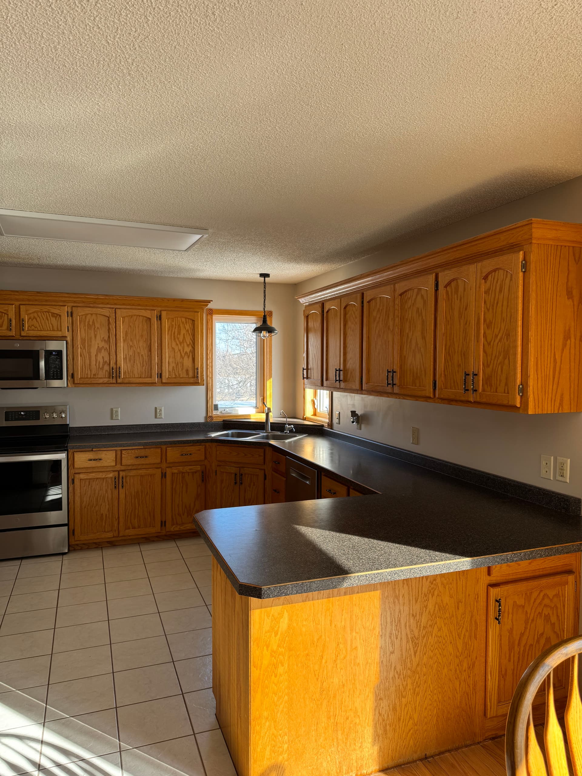 Gallery photos for Kitchen Redesign Brings Dark Elegance: Image #5