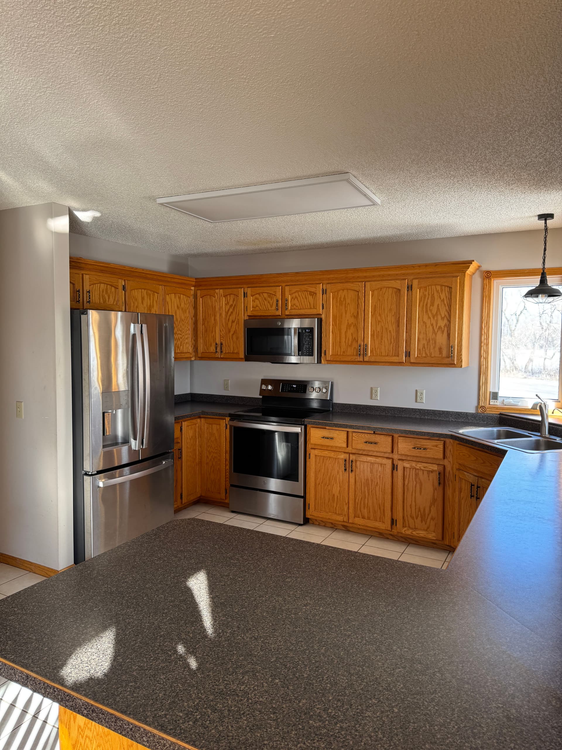 Gallery photos for Kitchen Redesign Brings Dark Elegance: Image #7