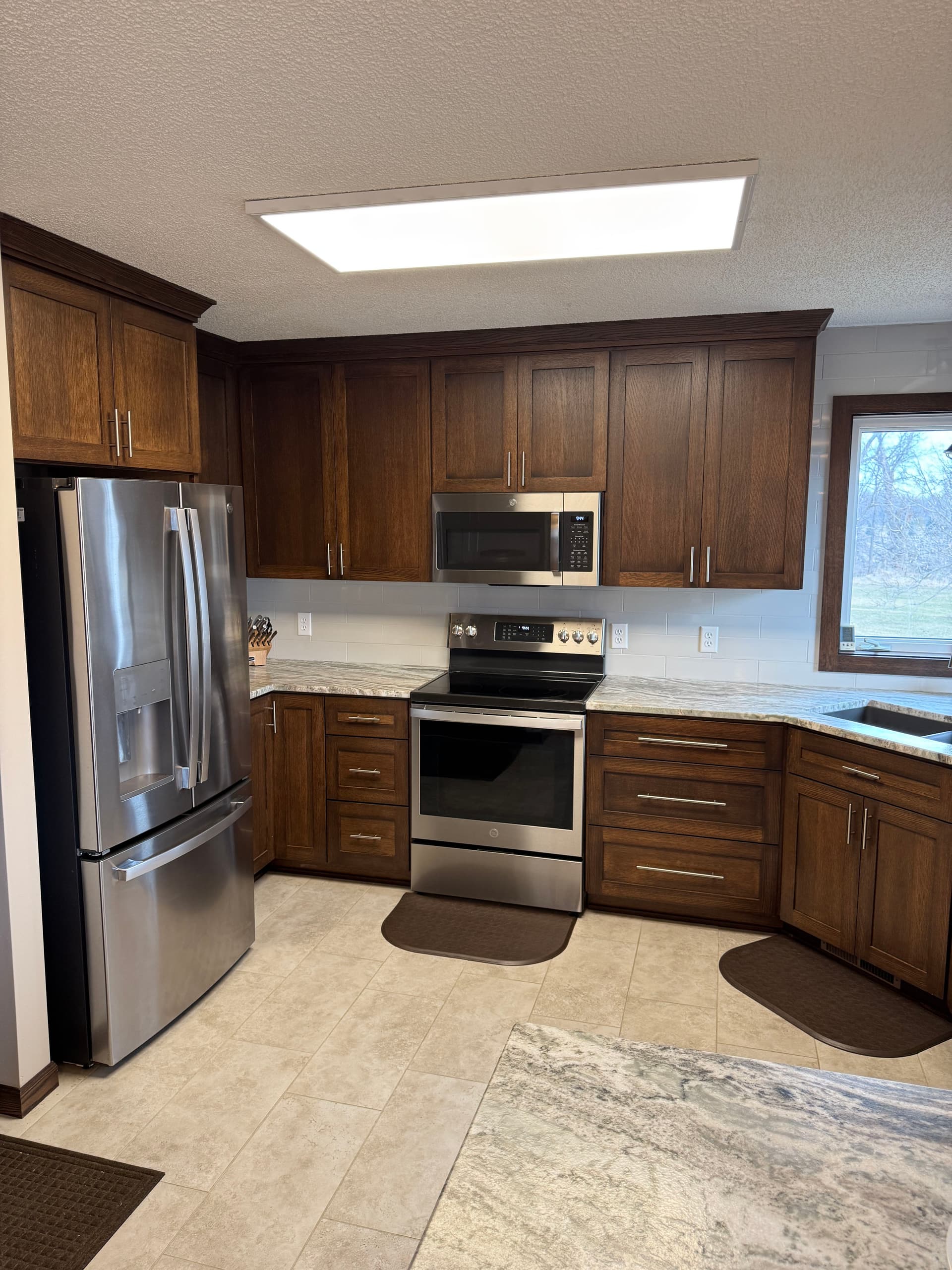 Gallery photos for Kitchen Redesign Brings Dark Elegance: Image #2